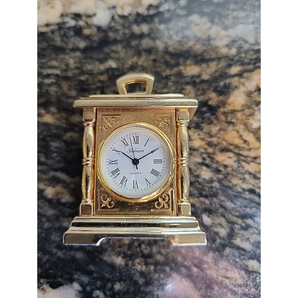 Mini Sunbeam Mantle Clock needs batteries